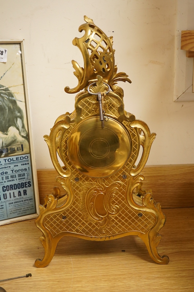 An early 20th century French Louis XV-style ormolu clock garniture - clock 50cm high